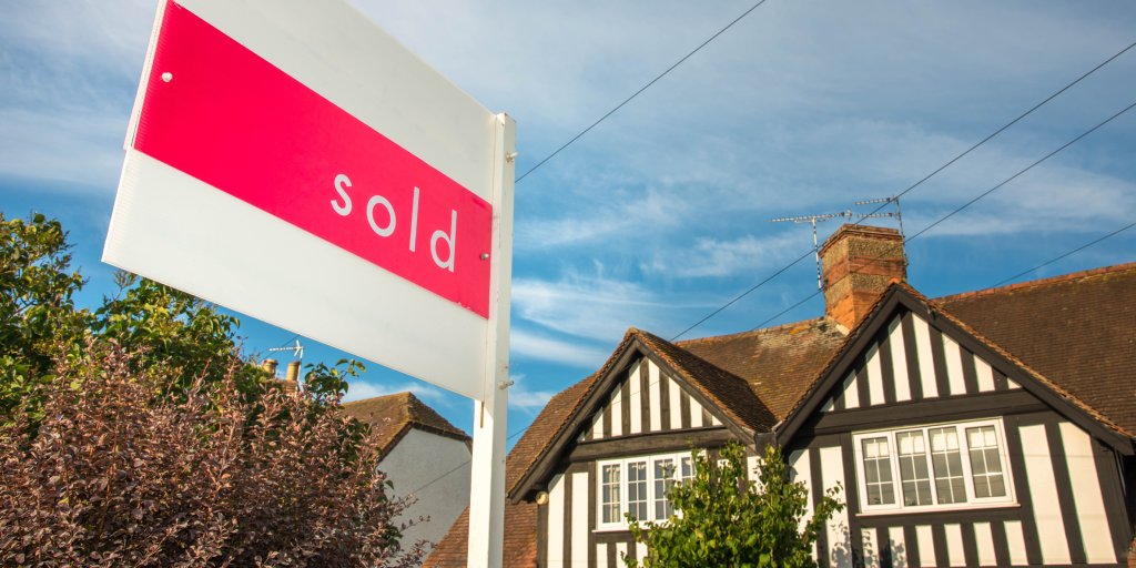 estate agent sold sign
